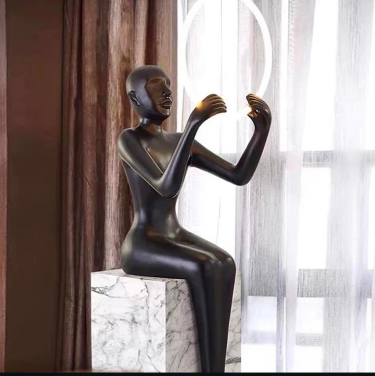 Led Lamp Sculpture Setting On A Metal Podium