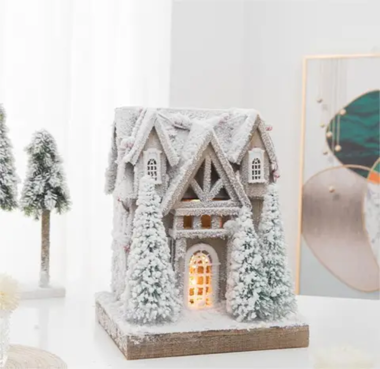 Illuminated Snowy Decorative House