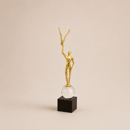 Modern Gold Sculpture Holding a Bird